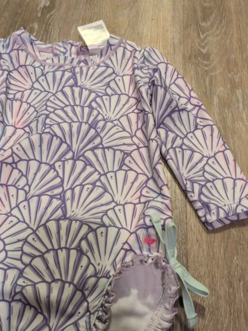 RuffleButts Baby Rashguard Swimsuit 18-24m Seashell Pattern